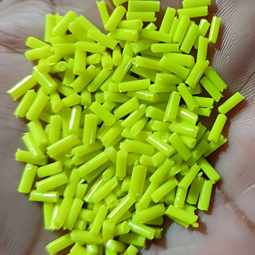 Large industrial packaging machine with white and blue parts on a light gradient background